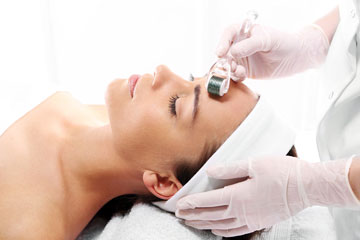 image of student performing dermaplaning